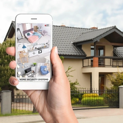 Sacramento vivint phone display of cctv live feed in front of a house